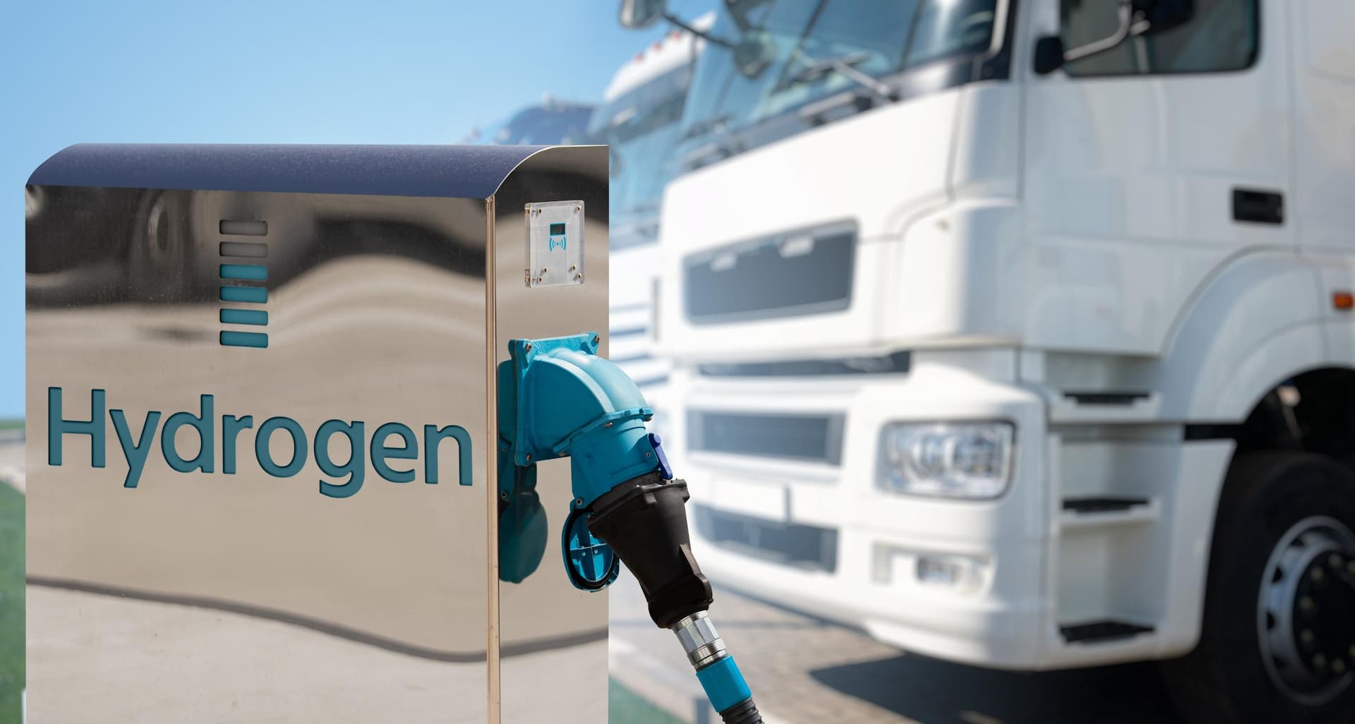 Hydrogen filling station on a background of trucks; Shutterstock ID 1932132881; purchase_order: -