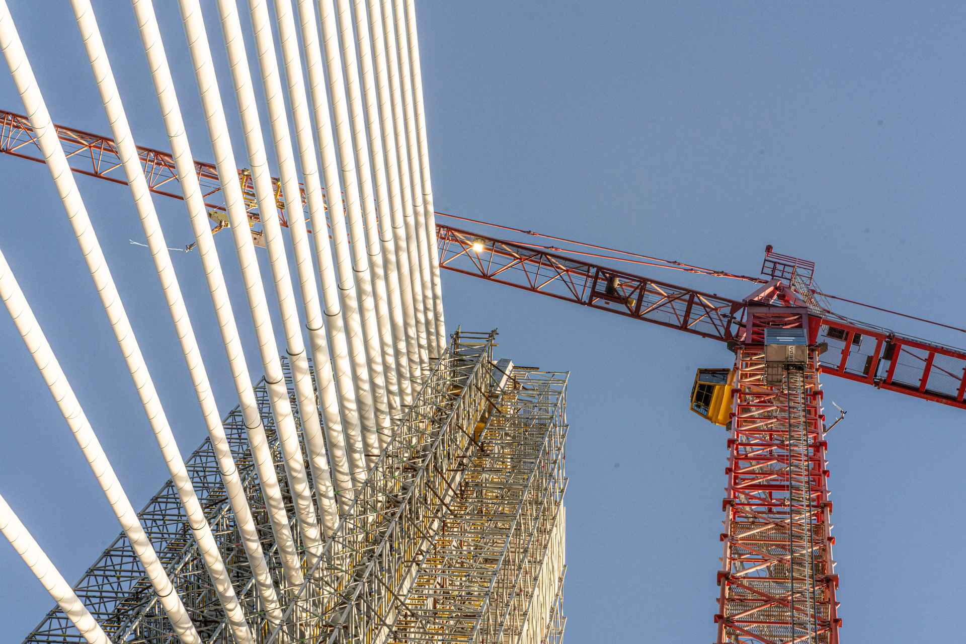 Detail of the Dronning Margrethe II Bridge pylon and stay cables, spaced at approximately 7 metres, supporting the 160‑metre main spans.